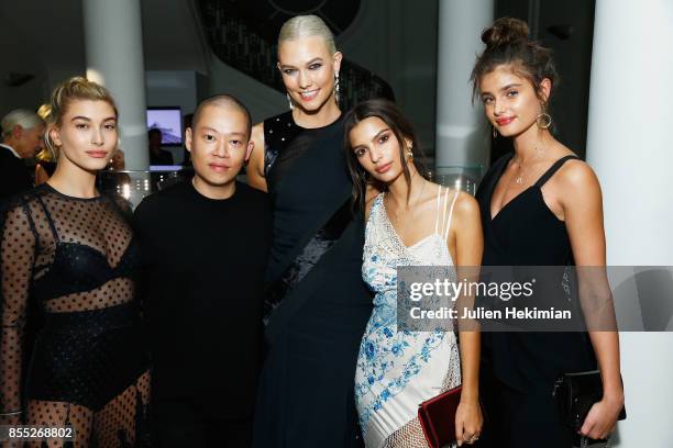 Hailey Baldwin, Jason Wu, Karlie Kloss, Emily Ratajkowski and Taylor Hill attend the Atelier Swarovski By Jason Wu dinner as part of the Paris...