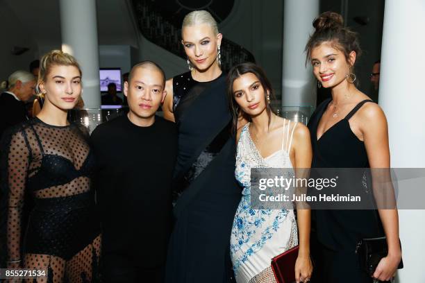 Hailey Baldwin, Jason Wu, Karlie Kloss, Emily Ratajkowski and Taylor Hill attend the Atelier Swarovski By Jason Wu dinner as part of the Paris...