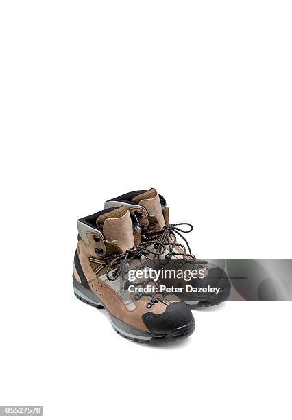 walking boots on white background. - hiking shoes stock-fotos und bilder