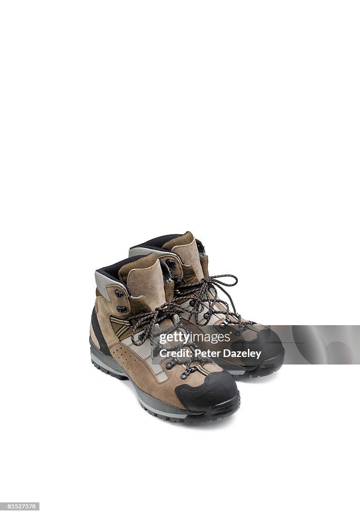 Walking boots on white background.