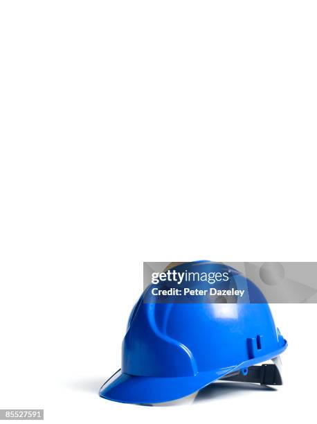 blue hard hat on white background - casco de trabajo fotografías e imágenes de stock