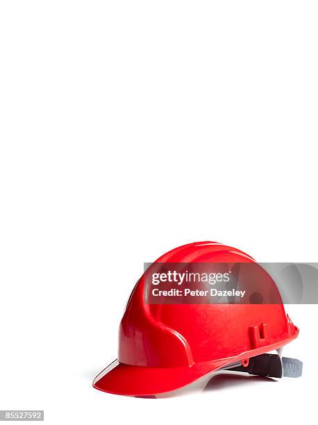 red hard hat on white background. - hard hat white background stock pictures, royalty-free photos & images