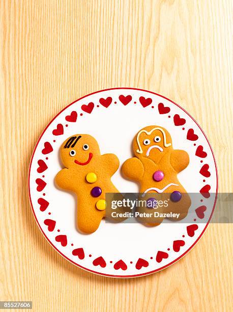 gingerbread-man gingerbread-woman - gingerbread biscuit stock pictures, royalty-free photos & images