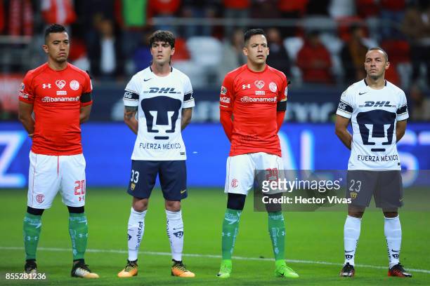 Players of Toluca and Pumas pose prior the 11th round match between Toluca and Pumas UNAM as part of the Torneo Apertura 2017 Liga MX at Nemesio Diez...