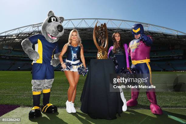 Cowboys and Storm cheerleaders and mascots pose with the Provan Summons trophy during a NRL Grand Final Media Opportunuty at ANZ Stadium on September...