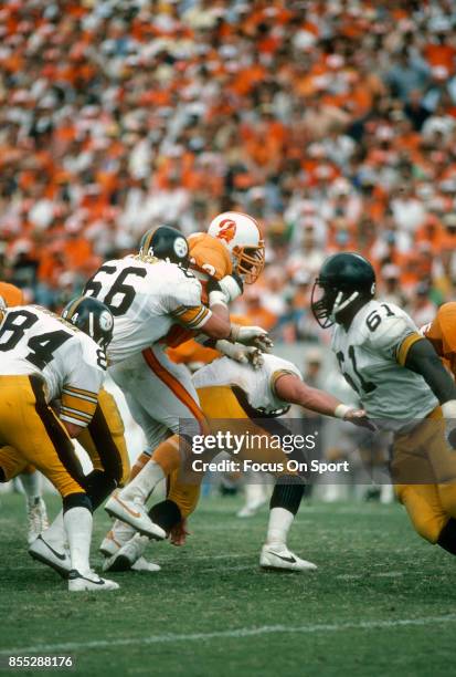 Lee Roy Selmon of the Tampa Bay Buccaneers rushes past Ted Petersen of the Pittsburgh Steelers during an NFL football game November 9, 1980 at Tampa...