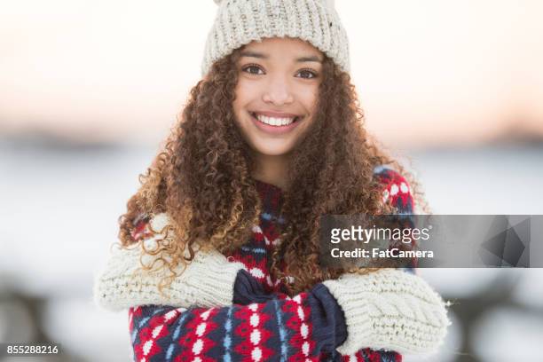 keeping warm - cute teens stock pictures, royalty-free photos & images