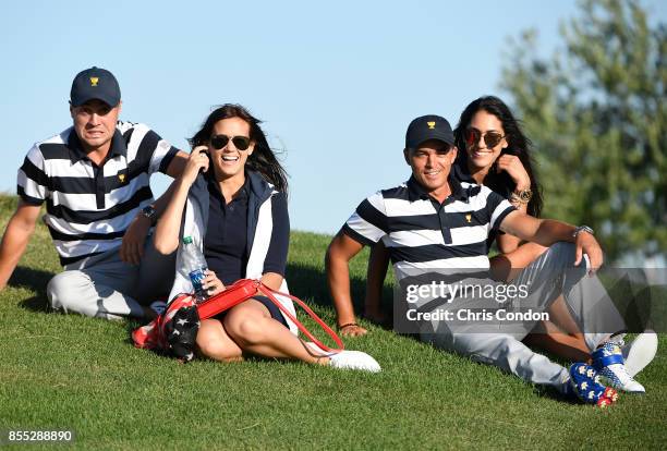 Allison Stokke and Rickie Fowler of the U.S. Team along with Justin Thomas of the U.S. Team and Jillian Wisniewski during the first round of the...