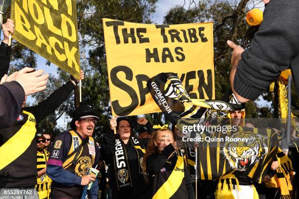 Tigers fans show their colours during a Richmond Tigers AFL training session at Punt Road Oval on September 29, 2017 in Melbourne, Australia.