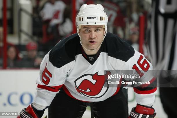 Bobby Holik of the New Jersey Devils prepares for a faceoff during a NHL game against the Carolina Hurricanes on March 18, 2009 at RBC Center in...