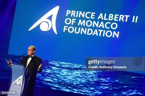 Prince Albert II of Monaco speaks on stage at the auction for the inaugural "Monte-Carlo Gala for the Global Ccean" honoring Leonardo DiCaprio at the...