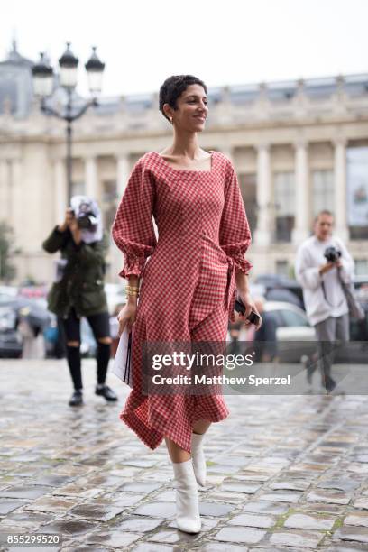 Yasmin Sewell is seen attending Paco Rabanne during Paris Fashion Week wearing Vejas on September 28, 2017 in Paris, France.