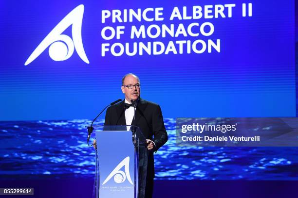 Prince Albert II of Monaco speaks on stage at the auction for the inaugural "Monte-Carlo Gala for the Global Ccean" honoring Leonardo DiCaprio at the...