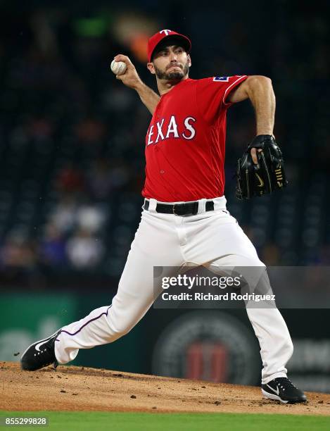 Miguel Gonzalez of the Texas Rangers delivers a pitch against the Oakland Athletics in the first inning of a baseball game at Globe Life Park in...