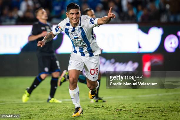 Victor Guzman of Pachuca celebrates after scoring his team's third goal during the 11th round match between Pachuca and Cruz Azul as part of the...