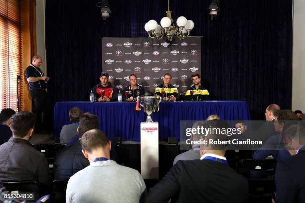 Crows captain Taylor Walker, Crows coach Don Pyke, Tigers coach Damien Hardwick and Tigers captain Trent Cotchin attend the 2017 AFL Grand Final...