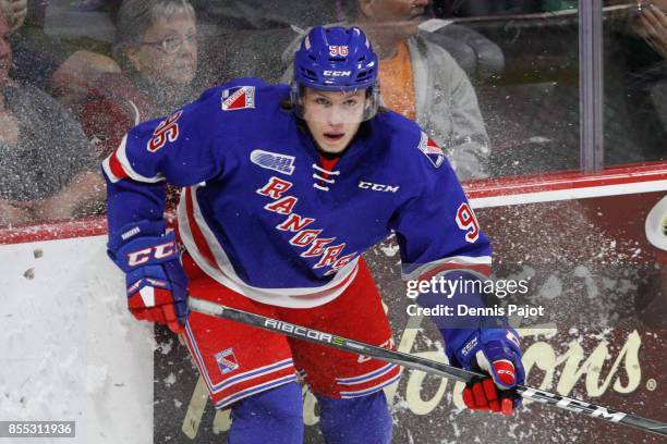 Forward Rickard Hugg of the Kitchener Rangers skates against the Windsor Spitfires on September 28, 2017 at the WFCU Centre in Windsor, Ontario,...