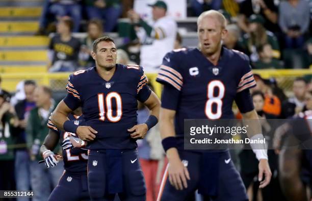 Mitchell Trubisky and Mike Glennon of the Chicago Bears warm up before the game against the Green Bay Packers at Lambeau Field on September 28, 2017...