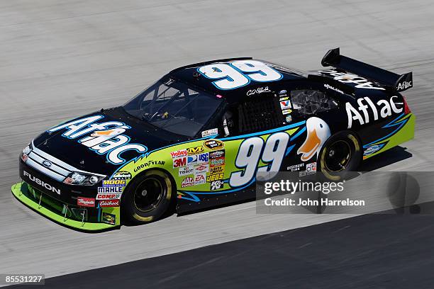 Carl Edwards driver of the Aflac ford drives during practice for the NASCAR Sprint Cup Series Food City 500 at Bristol Motor Speedway on March 20,...