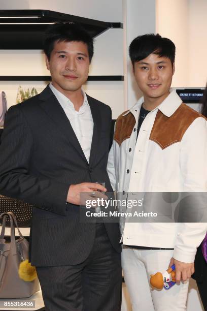 Store owner, Thomas Tchen and fashion designer, Liu Lisi attend the Lancaster Collection presentation during Paris Fashion Week Womenswear...