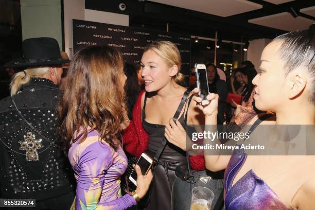 Guests attend the Lancaster Collection presentation during Paris Fashion Week Womenswear Spring/Summer 2018 on September 28, 2017 in Paris, France.