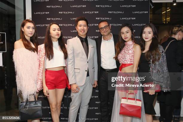 Yinzie Soo and Davide Ravizza attend the Lancaster Collection presentation during Paris Fashion Week Womenswear Spring/Summer 2018 on September 28,...