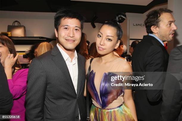 Store owner, Thomas Tchen and Julie Judd attend the Lancaster Collection presentation during Paris Fashion Week Womenswear Spring/Summer 2018 on...