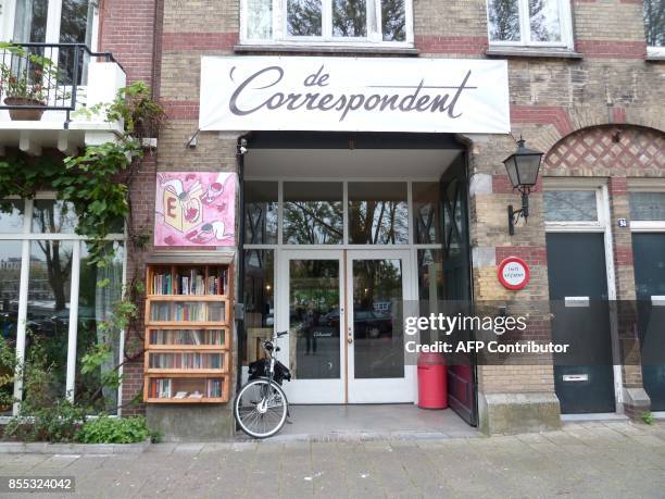 Picture taken on September 22, 2017 shows the entrance to the Amsterdam offices of the De Correspondent online news website. A Dutch ad-free news...