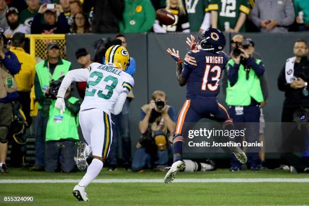 Kendall Wright of the Chicago Bears catches a touchdown pass past Damarious Randall of the Green Bay Packers in the second quarter at Lambeau Field...