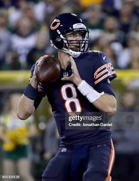 Mike Glennon of the Chicago Bears drops back to pass in the second quarter against the Green Bay Packers at Lambeau Field on September 28, 2017 in...