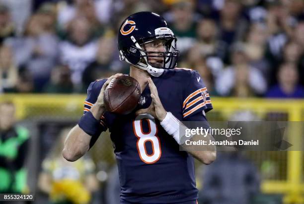 Mike Glennon of the Chicago Bears drops back to pass in the second quarter against the Green Bay Packers at Lambeau Field on September 28, 2017 in...