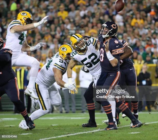 Chicago Bears quarterback Mike Glennon fumbles under pressure from Green Bay Packers outside linebacker Clay Matthews in the first quarter on...