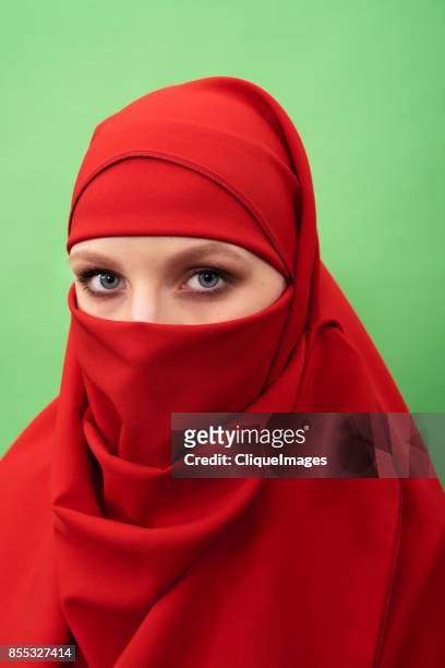 mysterious woman in niqab - cliqueimages stock pictures, royalty-free photos & images