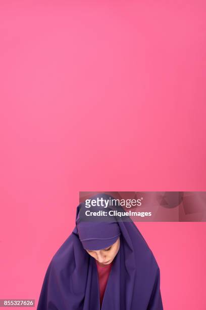 modest woman in hijab - cliqueimages stock pictures, royalty-free photos & images
