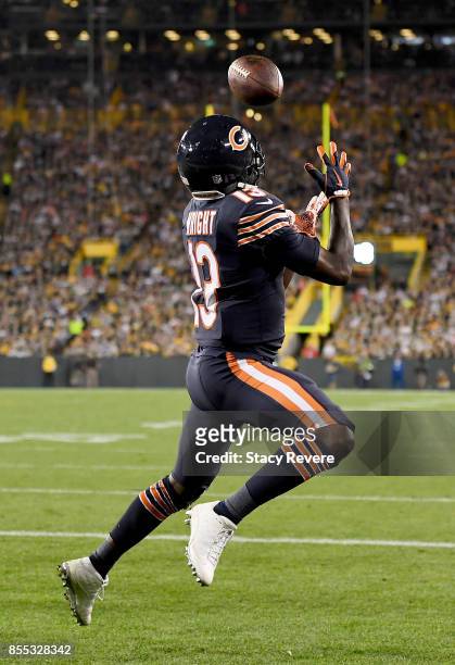 Kendall Wright of the Chicago Bears catches a touchdown pass in the second quarter against the Green Bay Packers at Lambeau Field on September 28,...