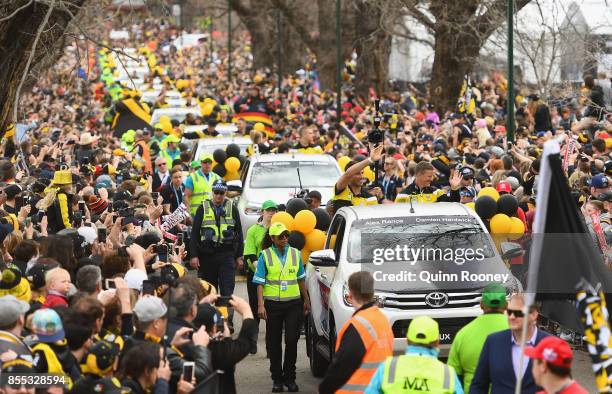 Alex Rance and Damien Hardwick of the Tigers wave to the crowd during the 2017 AFL Grand Final Parade ahead of the Grand Final between the Adelaide...