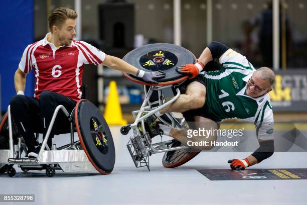 In this handout image provided by Jaguar Land Rover, Derek Hough and Robert Irvine take part in the Jaguar Land Rover celebrity wheelchair rugby...