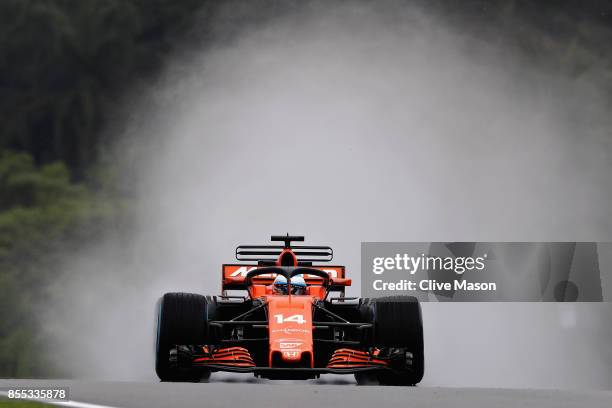 Fernando Alonso of Spain driving the McLaren Honda Formula 1 Team McLaren MCL32 fitted with the halo on track during practice for the Malaysia...