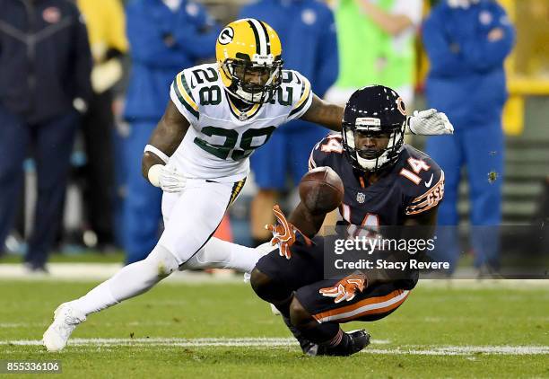 Deonte Thompson of the Chicago Bears makes a catch in front of Josh Hawkins of the Green Bay Packers in the third quarter at Lambeau Field on...