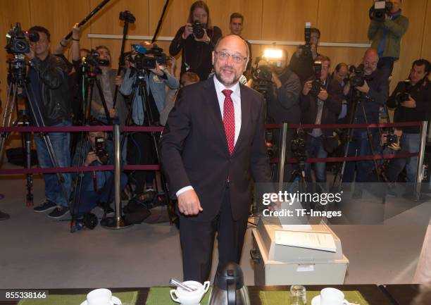 German Social Democrat and chancellor candidate Martin Schulz casts his ballot in German federal elections on September 24, 2017 in Wuerselen,...