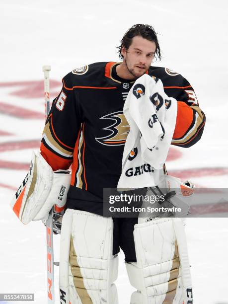 Anaheim Ducks goalie John Gibson on the ice during a break in the action of the second period of an NHL preseason game against the San Jose Sharks,...