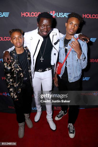 Mandla Morris, Michael Blackson, and Kailand Morris attend Hologram USA's Gala Preview at Hologram USA Theater on September 28, 2017 in Los Angeles,...