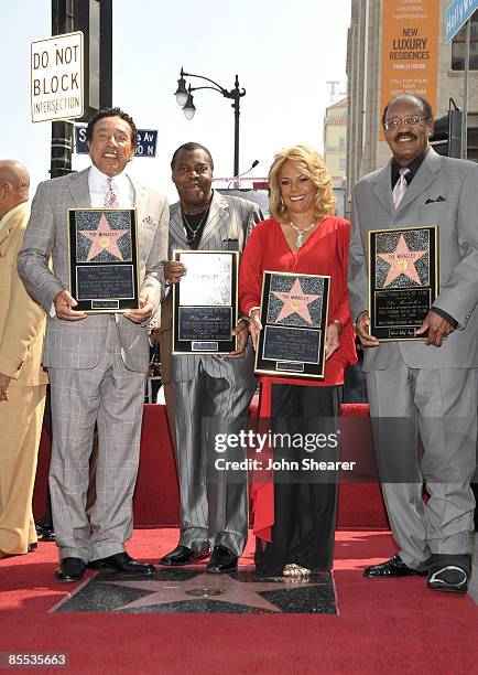 Singers Smokey Robinson, Pete Moore, Claudette Robinson, and Bobby Rogers of The Miracles are honored with a star on the Hollywood Walk Of Fame on...