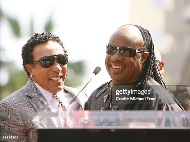 Smokey Robinson and Stevie Wonder attend the ceremony honoring "The Miracles" with a star on the Hollywood Walk of Fame on March 20, 2009 in...