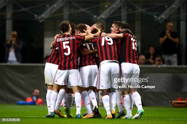 Mateo Musacchio of AC Milan celebrates with his team mates after scoring a goal during the UEFA Europa League Group D match between AC Milan and HNK...