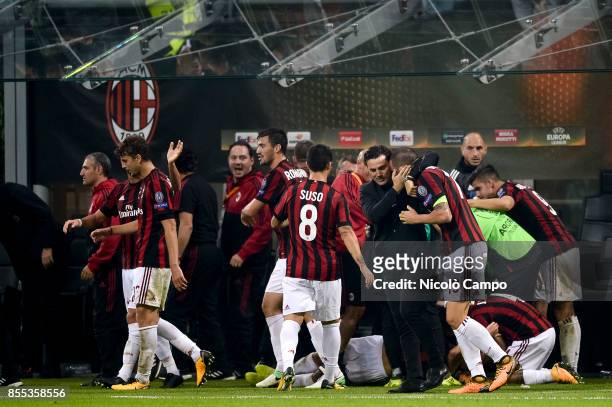 Vincenzo Montella , head coach of AC Milan, hugs Leonardo Bonucci after the goal of Patrick Cutrone during the UEFA Europa League Group D match...