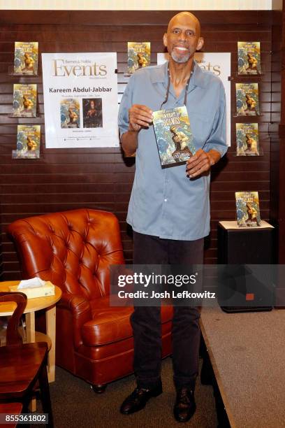 Kareem Abdul Jabbar with his book 'Mycroft Holmes and the Apocalypse Handbook' at Barnes & Noble at The Grove on September 28, 2017 in Los Angeles,...