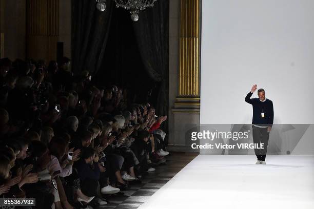 Fashion designer Dries Van Noten walks the runway during the Dries Van Noten Ready to Wear Spring/Summer 2018 fashion show as part of the Paris...
