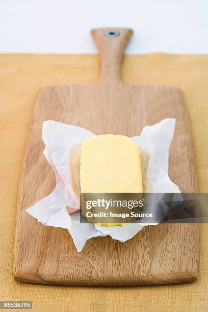 block of butter - bulletin board stockfoto's en -beelden