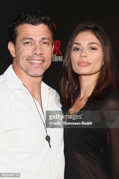 Al Coronel and Christiana Leucas attends the Queen Mary's Dark Harbor Media & VIP Preview Event on September 28, 2017 in Long Beach, California.